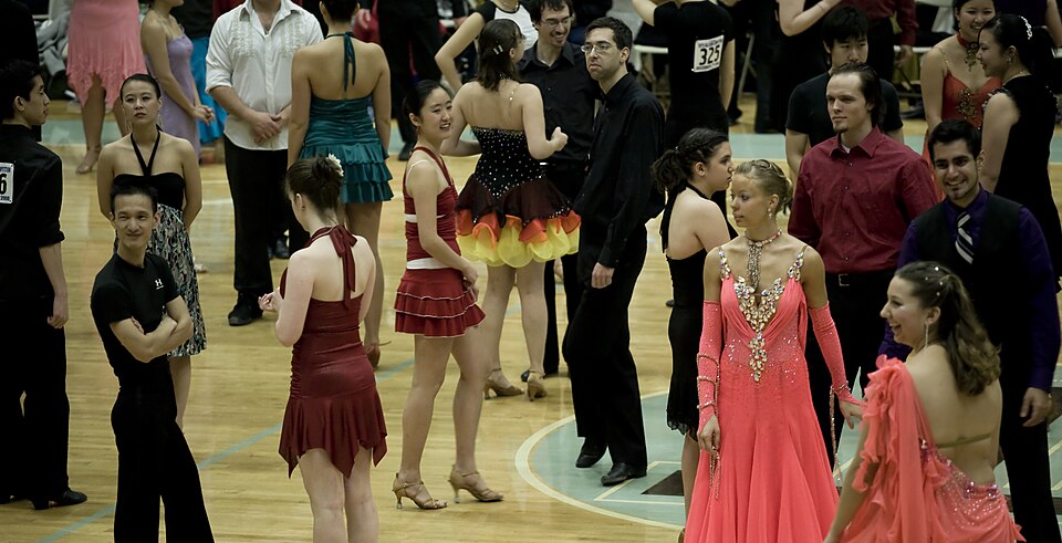 A couple of people waiting to dance.