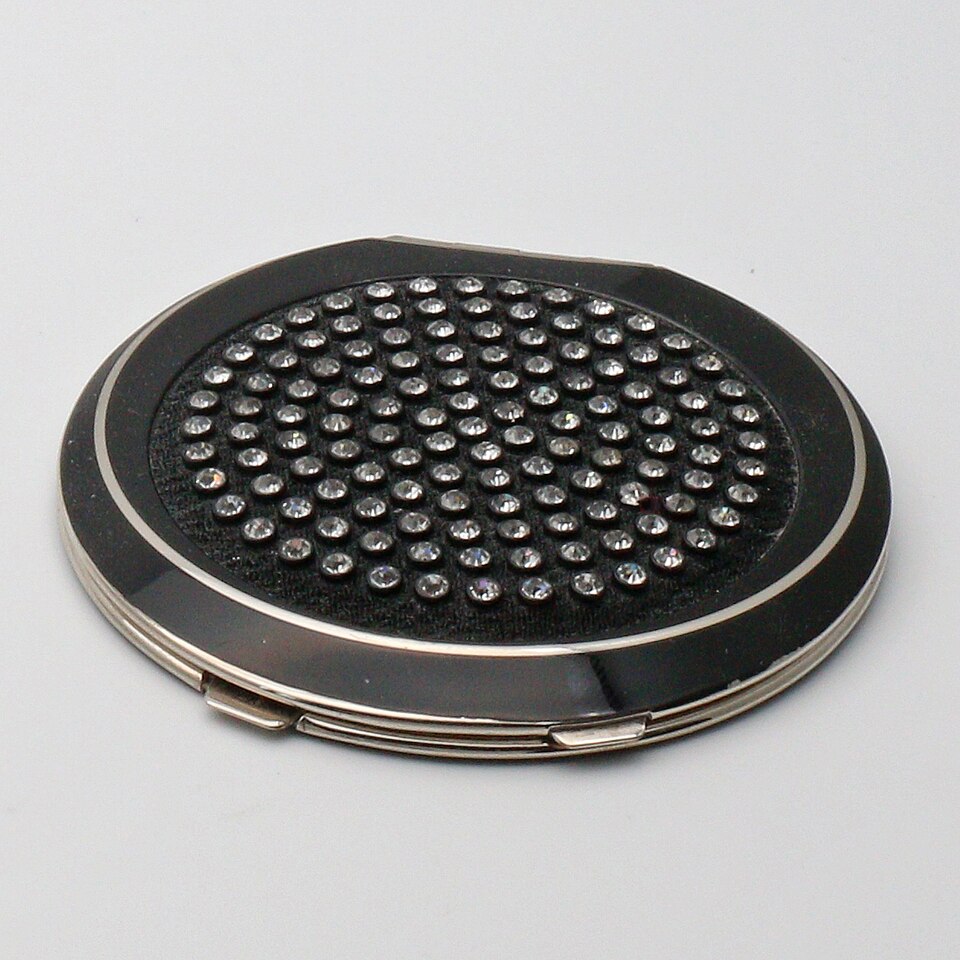 Art Deco black enamelled powder compact by Rowenta. 1930s. Marked Rowenta Foreign. Reg 798372